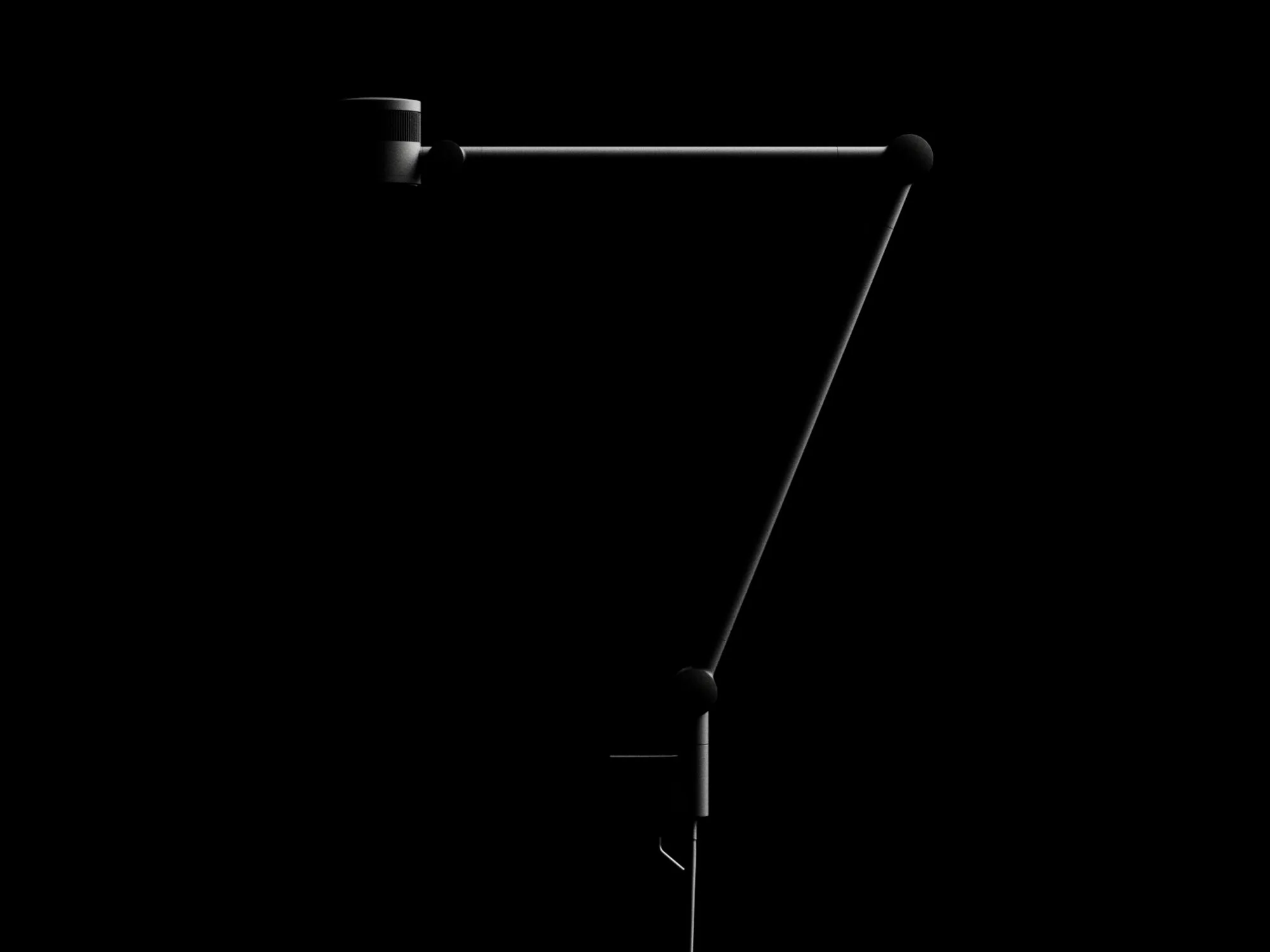 FOCAL lamp barely visible against a black background