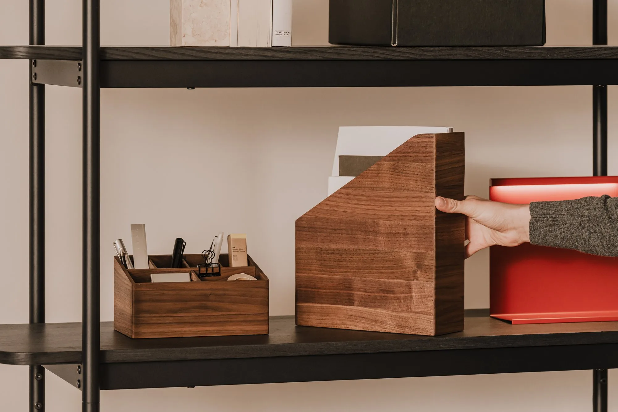 Walnut organiser and A4 file holder on a black shelf