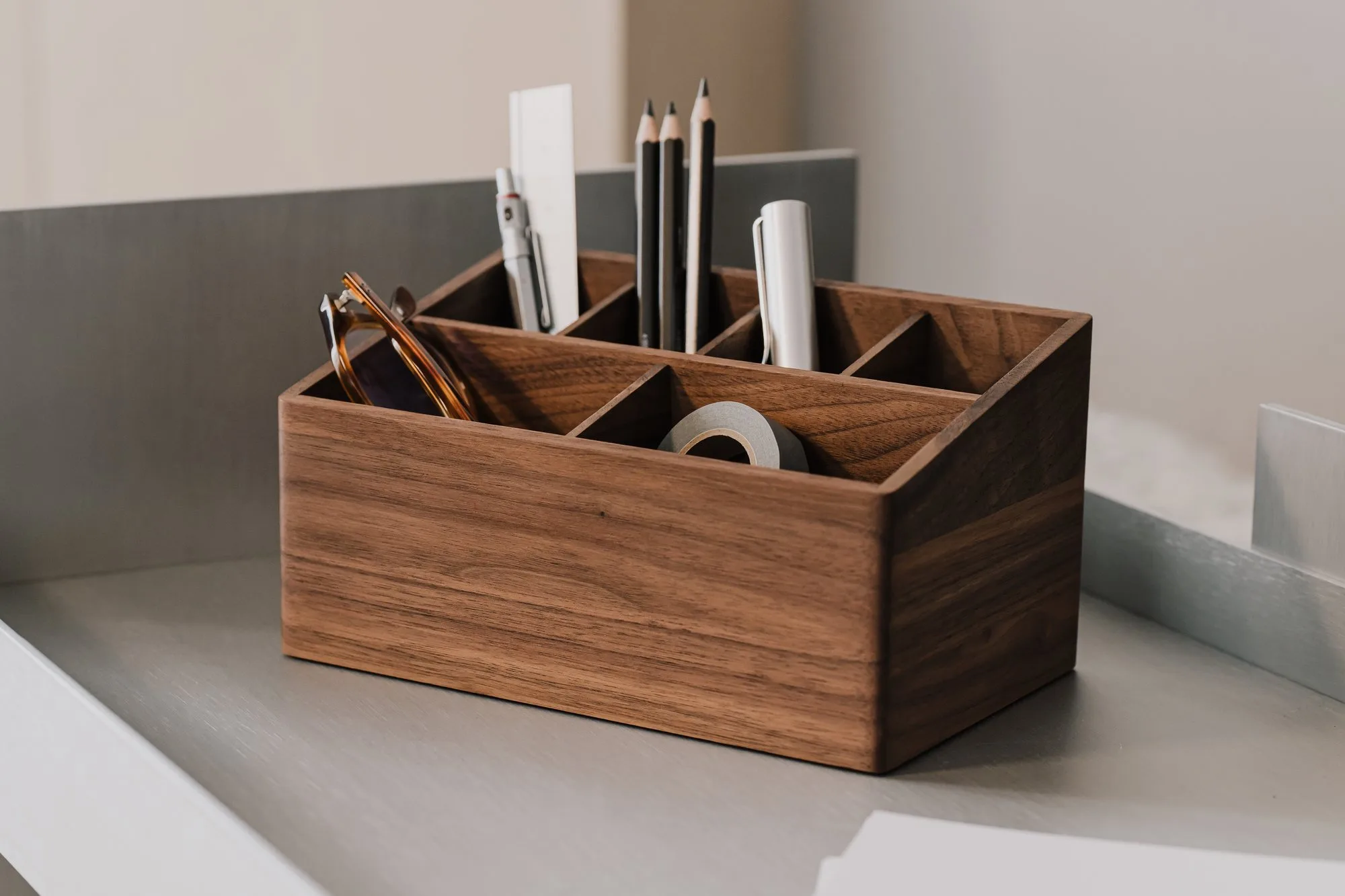 Walnut organiser with compartments seen from above