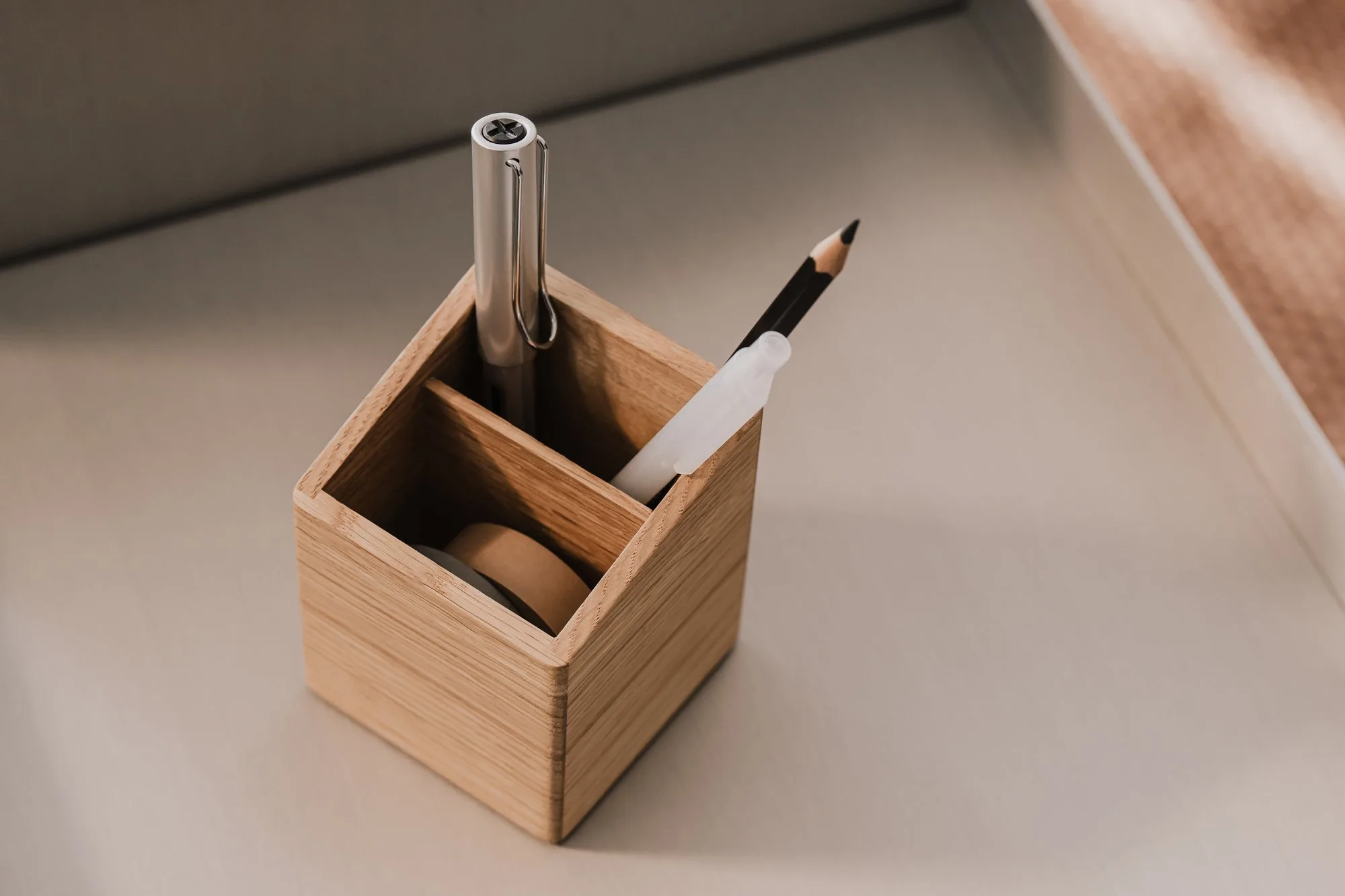 Oak pen holder with a pen and pencil
