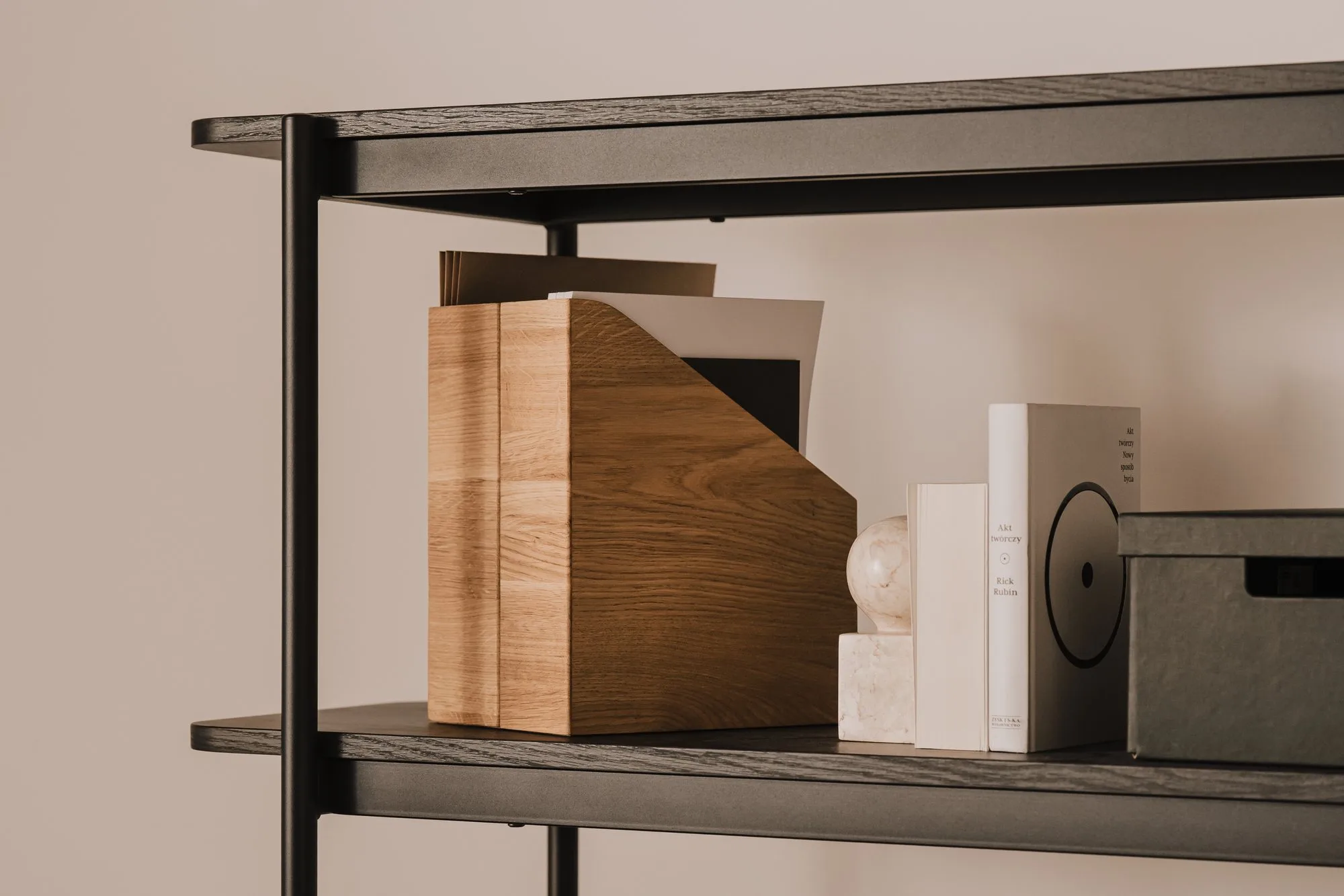 Oak A4 file holders on a black shelf