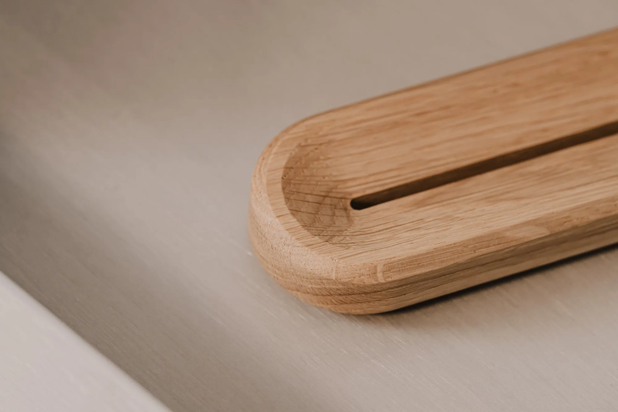 Close-up of an oak card holder